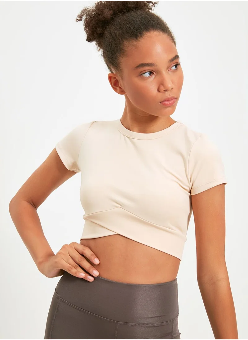 ترينديول Crew Neck Wrap Crop Top