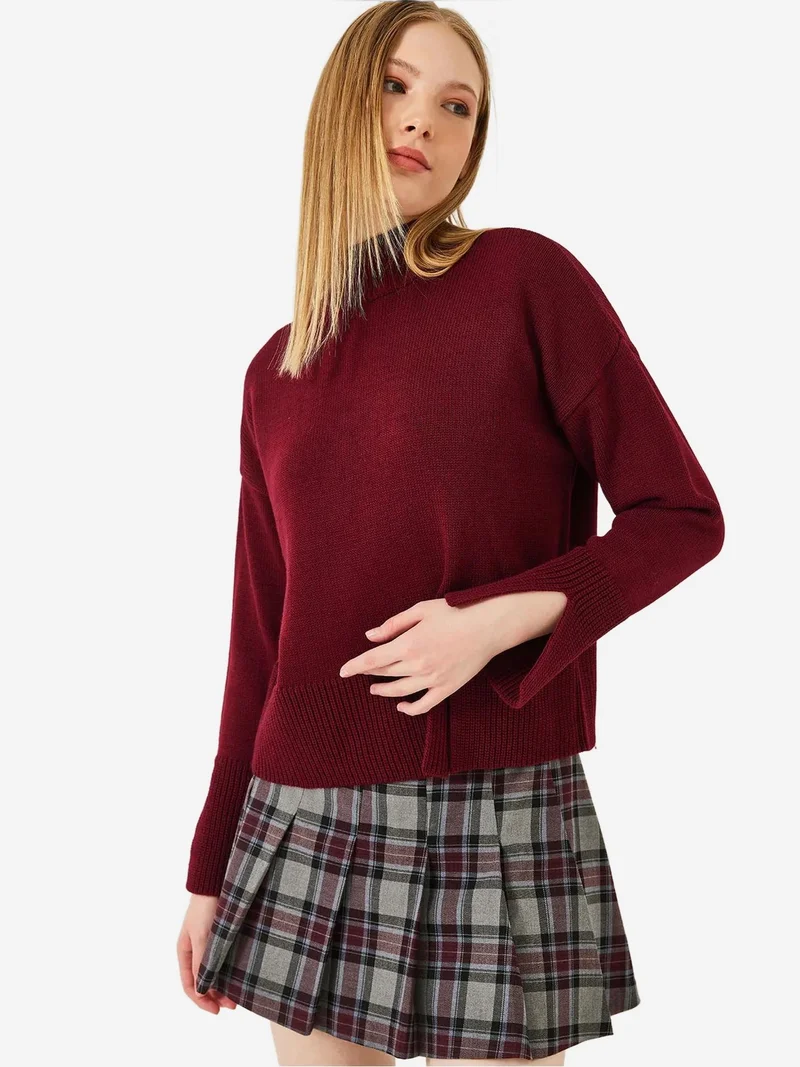 بيانكو لوتشي كنزة بياقة عالية بقصة مريحة وفتحة جانبية