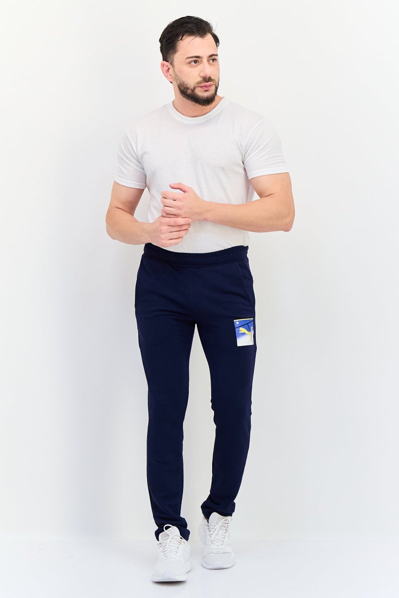 PUMA Men Sportswear Fit Drawstring Outdoor Sweatpants, Navy - Image 4