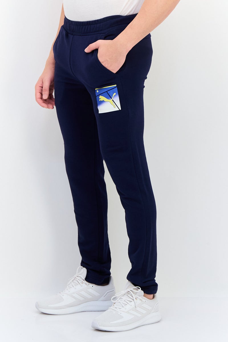 PUMA Men Sportswear Fit Drawstring Outdoor Sweatpants, Navy - Image 2