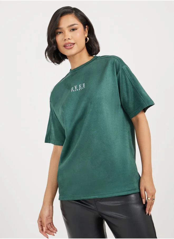 Styli Oversized Suede Look Overthinking Slogan T-Shirt