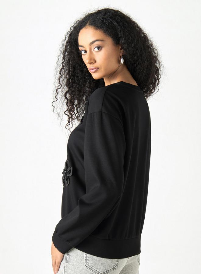 تواكستريمز سويت شيرت فضفاض بأكمام طويلة وزخرفة زهور من توإكستريمز - Image 3