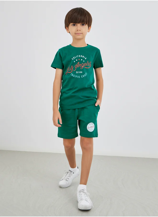 ستايلي Styli Slogan Print Round Neck T-Shirt and Shorts Set