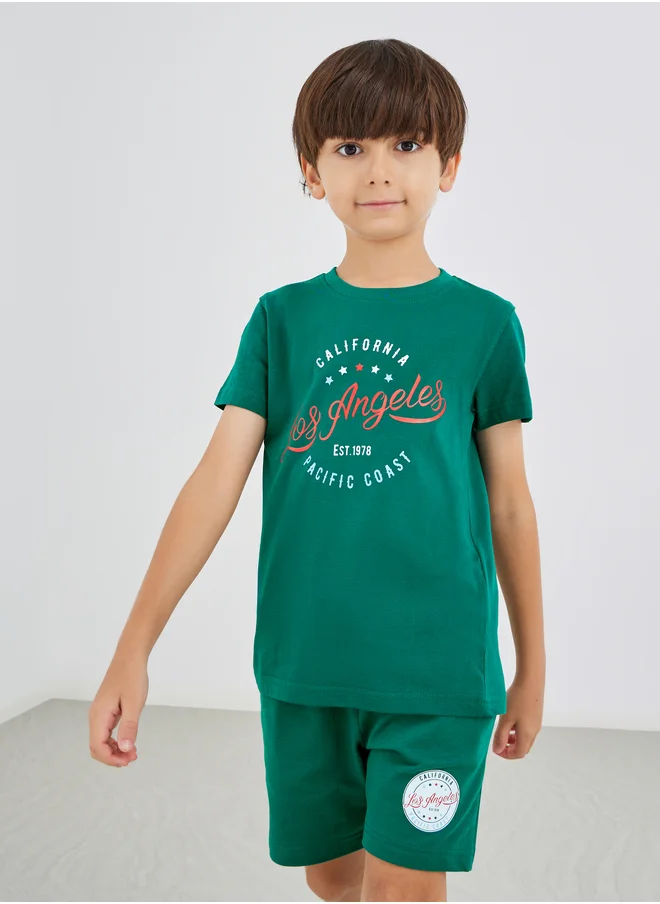 ستايلي Styli Slogan Print Round Neck T-Shirt and Shorts Set