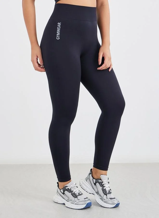 Styli Text Detail Seamless Side Sports Bra and Leggings Set