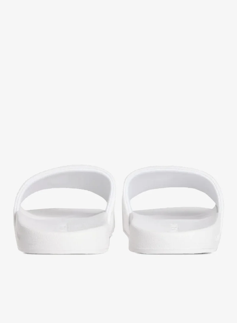 Calvin Klein Jeans Bright White Logo Slides for Women | Best Price UAE