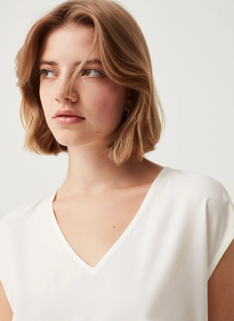 او في اس White