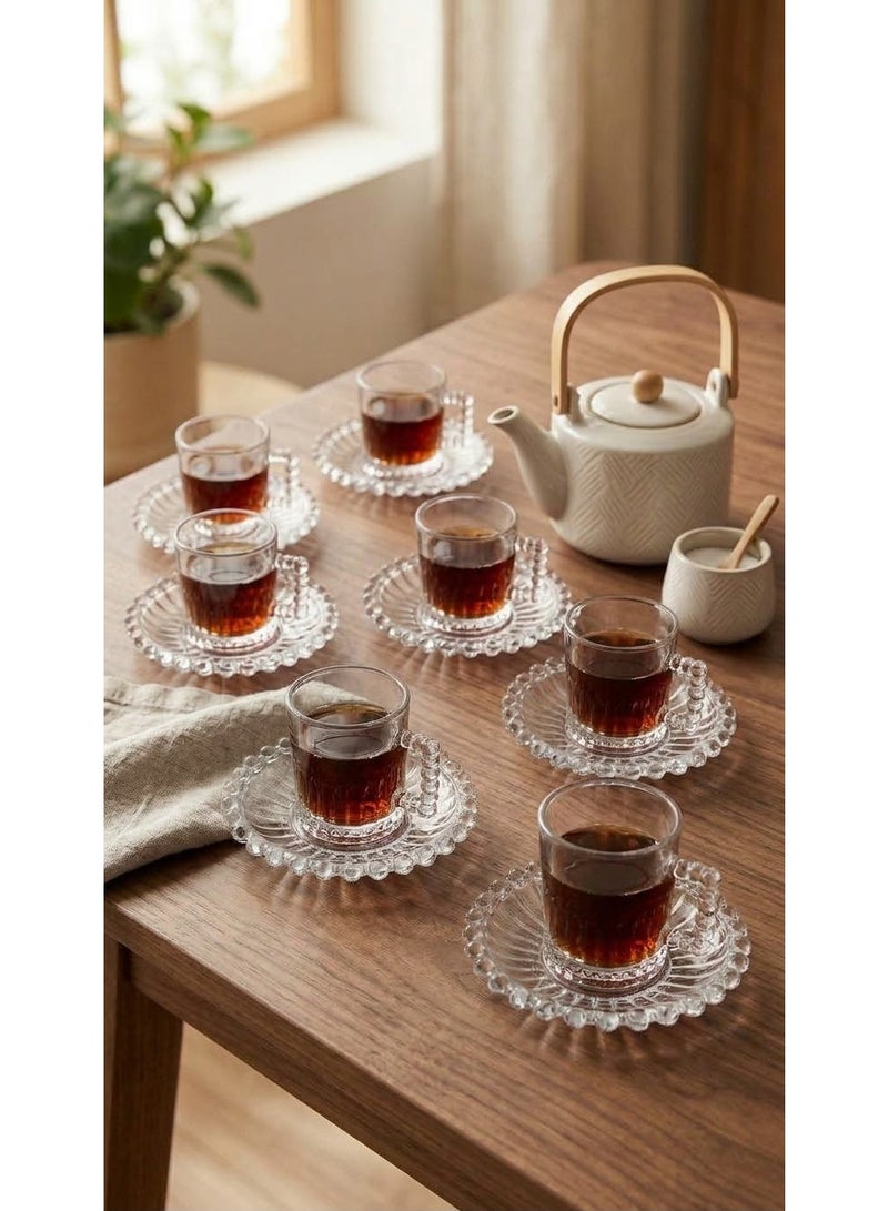 Rayan A 12-piece tea glass and saucer set featuring a beautiful, modern design and high-quality glass. - Image 1