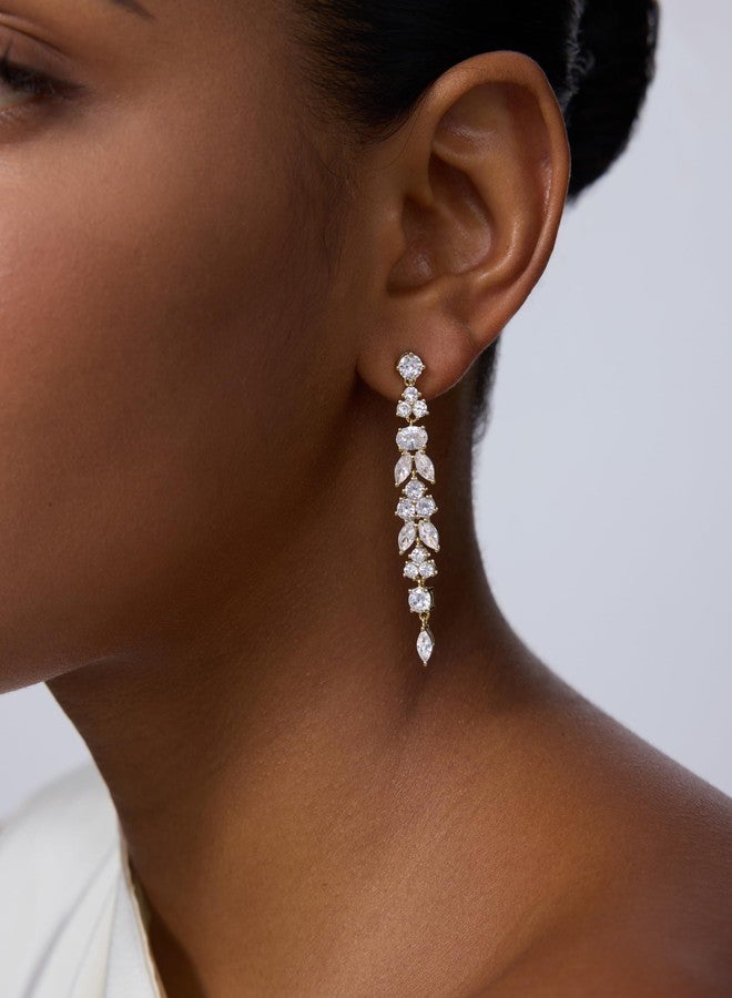 PAVOI أقراط دائرية متدلية من الزركونيا المكعبة مطلية بالذهب الأصفر عيار 14 للنساء - أقراط كريستالية طويلة للعروس - مجوهرات زفاف متدلية على شكل ماسة بيضاوية للعرائس وصديقات العروس - Image 2