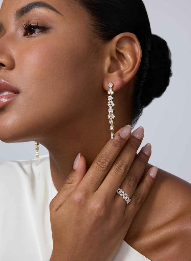 PAVOI أقراط دائرية متدلية من الزركونيا المكعبة مطلية بالذهب الأصفر عيار 14 للنساء - أقراط كريستالية طويلة للعروس - مجوهرات زفاف متدلية على شكل ماسة بيضاوية للعرائس وصديقات العروس - Image 4