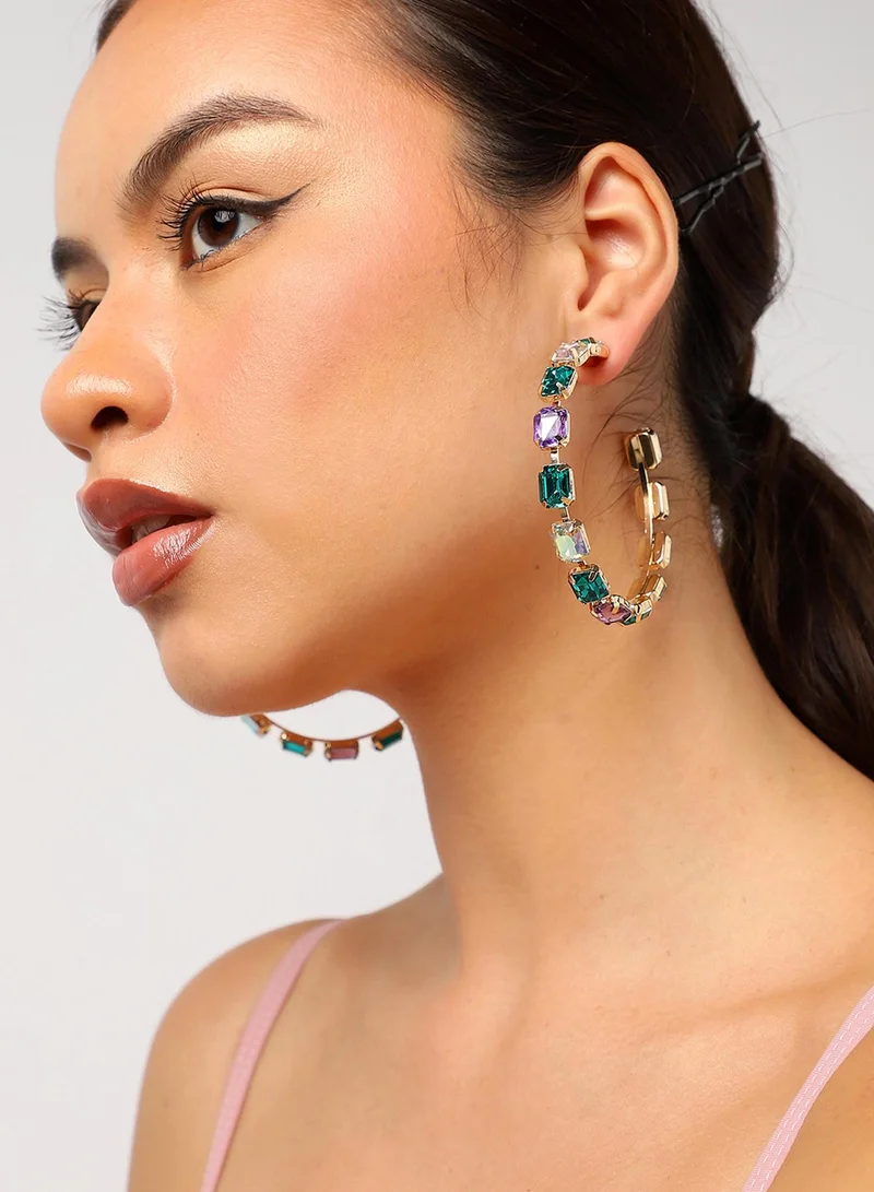 سوهي أقراط هوب مطلية بالذهب بالأحجار الخضراء