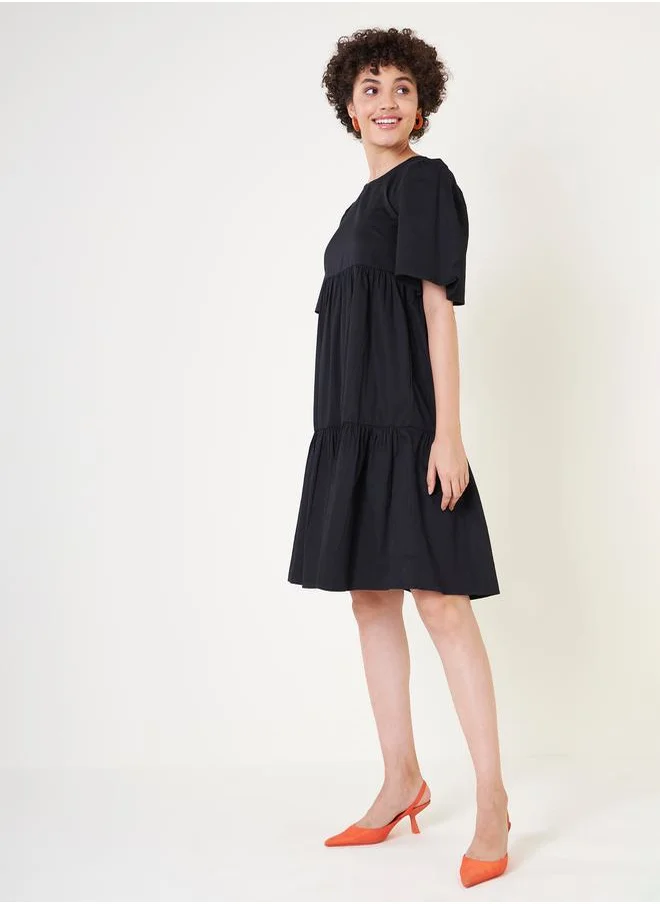 FEMELLA Cotton Tie-Up Back Tiered Midi Dress by Styli