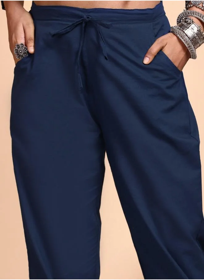 آي شين Mid Rise Women Indigo Cotton Kurta Set with Embroidered pattern Tunic and Palazzo features a Round neckline and Three-Fourth Sleeve secured with Elastic closure and styled in Straight Fit ideal for Festive moments — a must-have for your statement wardrobe.