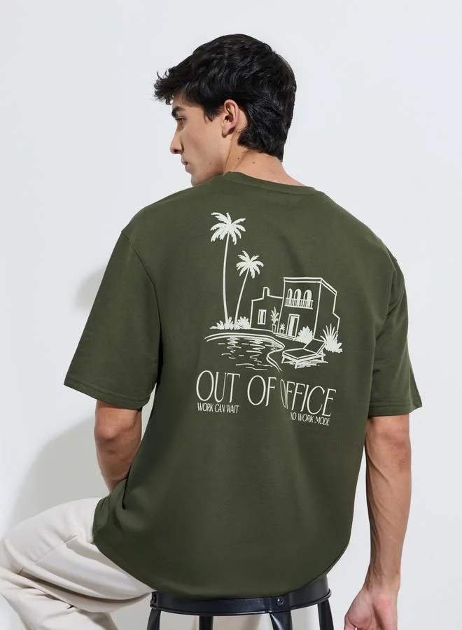 Styli Olive Green Graphic Print Crew Neck Oversized T-Shirt