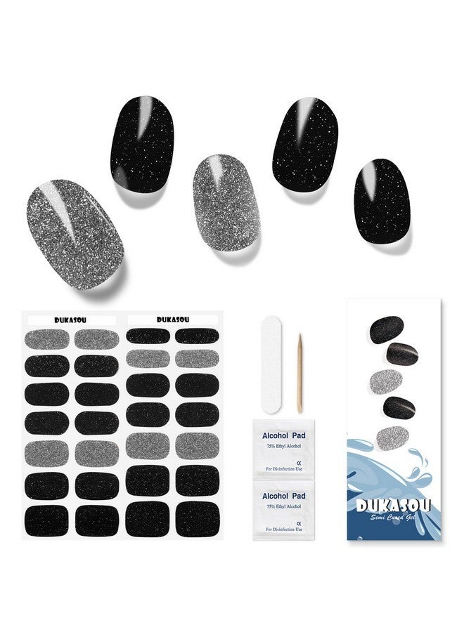 دوكاسو شرائط أظافر جل شبه معالجة، 28 قطعة من شرائط أظافر جل سوداء لامعة تحتاج إلى ضوء الأشعة فوق البنفسجية، ملصقات أظافر جل طويلة الأمد ولفافة أظافر كاملة للنساء والفتيات والأطفال، تتضمن وسادات تحضير ومبرد أظافر وعصا خشبية - Image 1