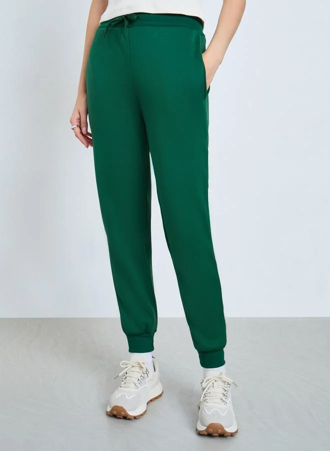 Styli Green Knitted Solid Drawstring Joggers