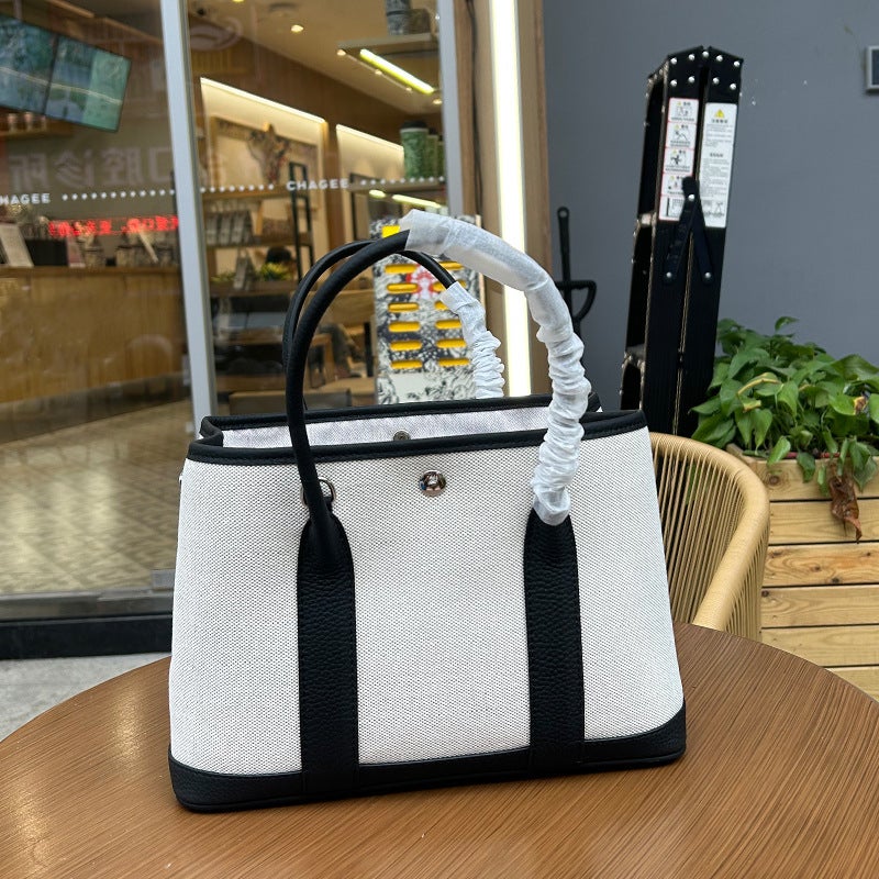Large Capacity Tote Women'S Bag Garden Bag All-Match Canvas Patchwork Genuine Leather One-Shoulder Crossbody Portable Shopping Bag Bucket Bag - Image 1