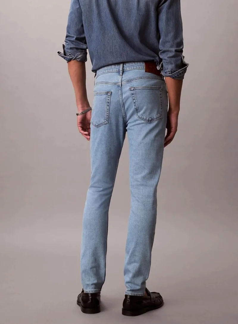 Calvin Klein ADAM LT STONE Slim Tapered Jeans for Men | Best Price UAE