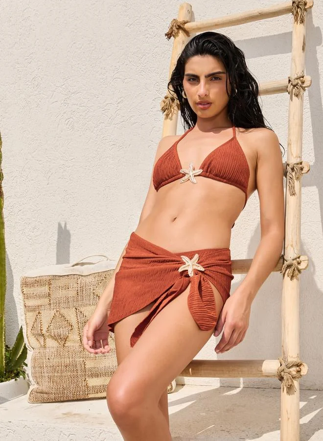 Styli  Pack of 3 - Textured Tie Back Padded Triangle Bikini, Brief and Wrap Skirt with Star Fish Metal Trim for Women | Best Price UAE