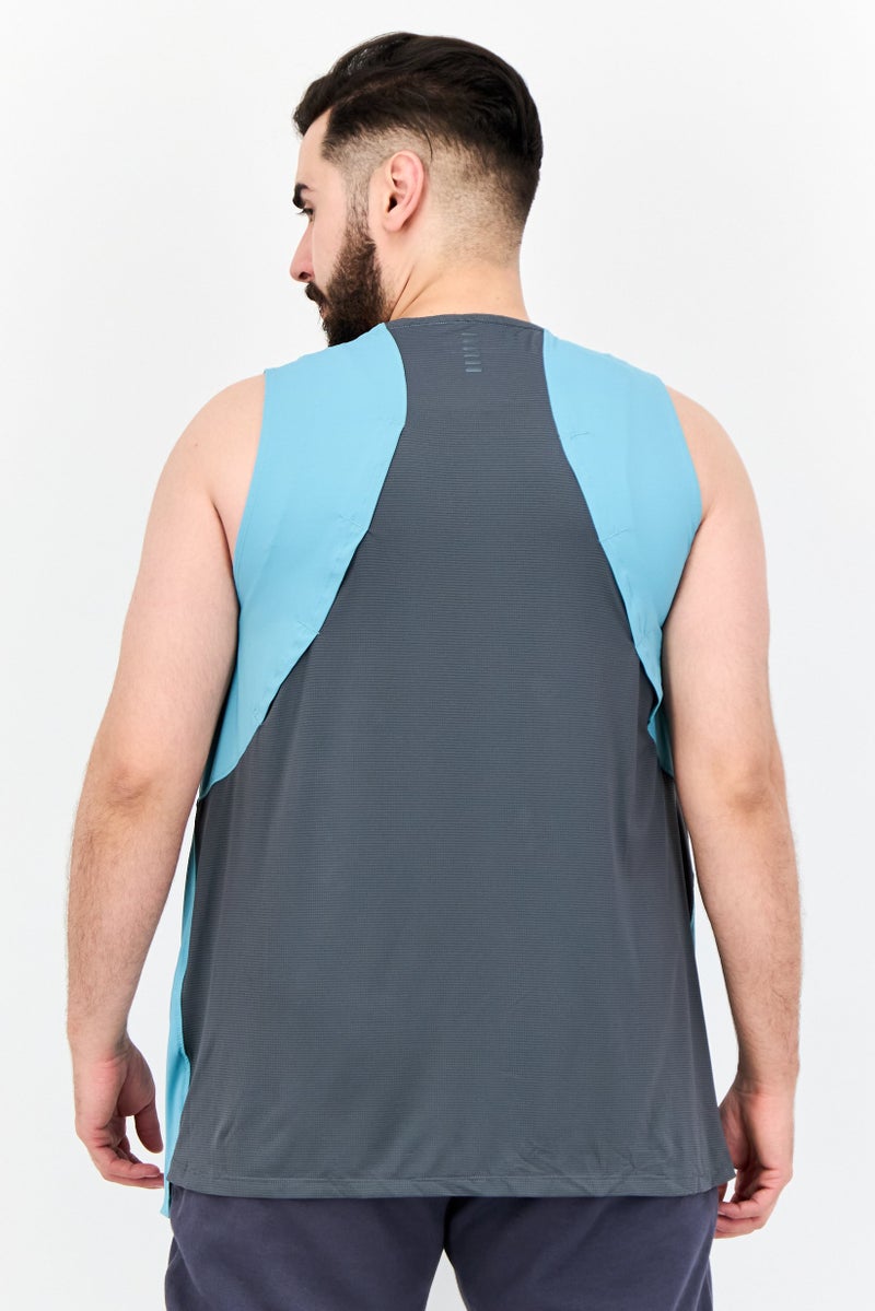 UNDER ARMOUR سترة جري بدون أكمام للرجال، أزرق متوسط - Image 3