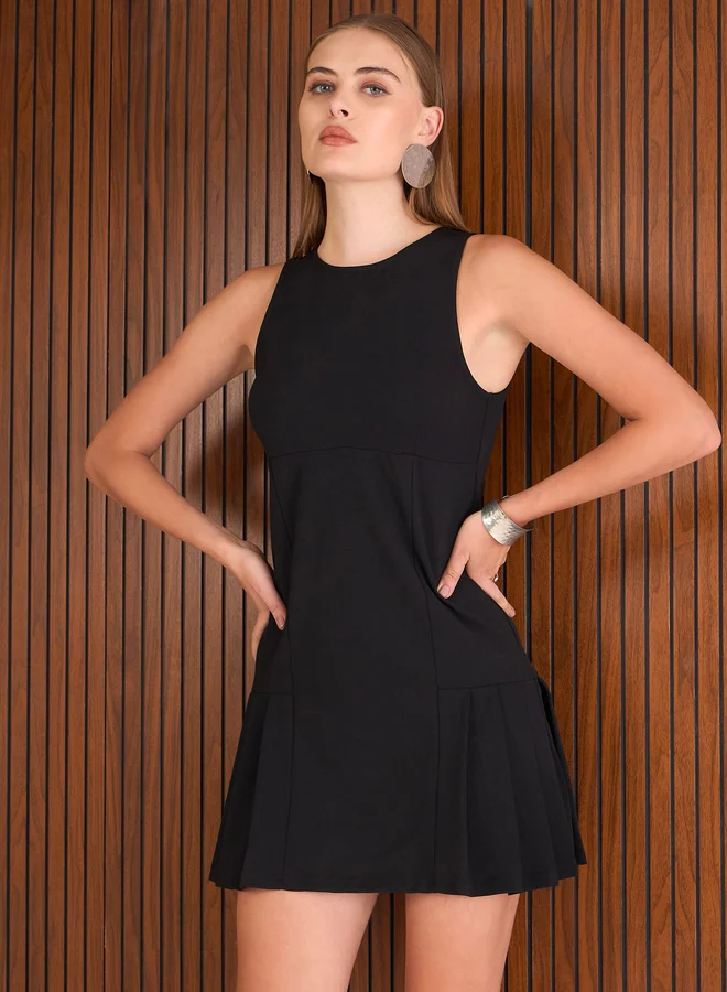 SASSAFRAS Sassafras Black Solid Pleated Hem A-Line Mini Dress