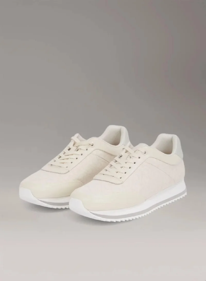 كالفن كلاين حذاء رياضي مزين بشعار كلفن كلاين بنمط جاكار