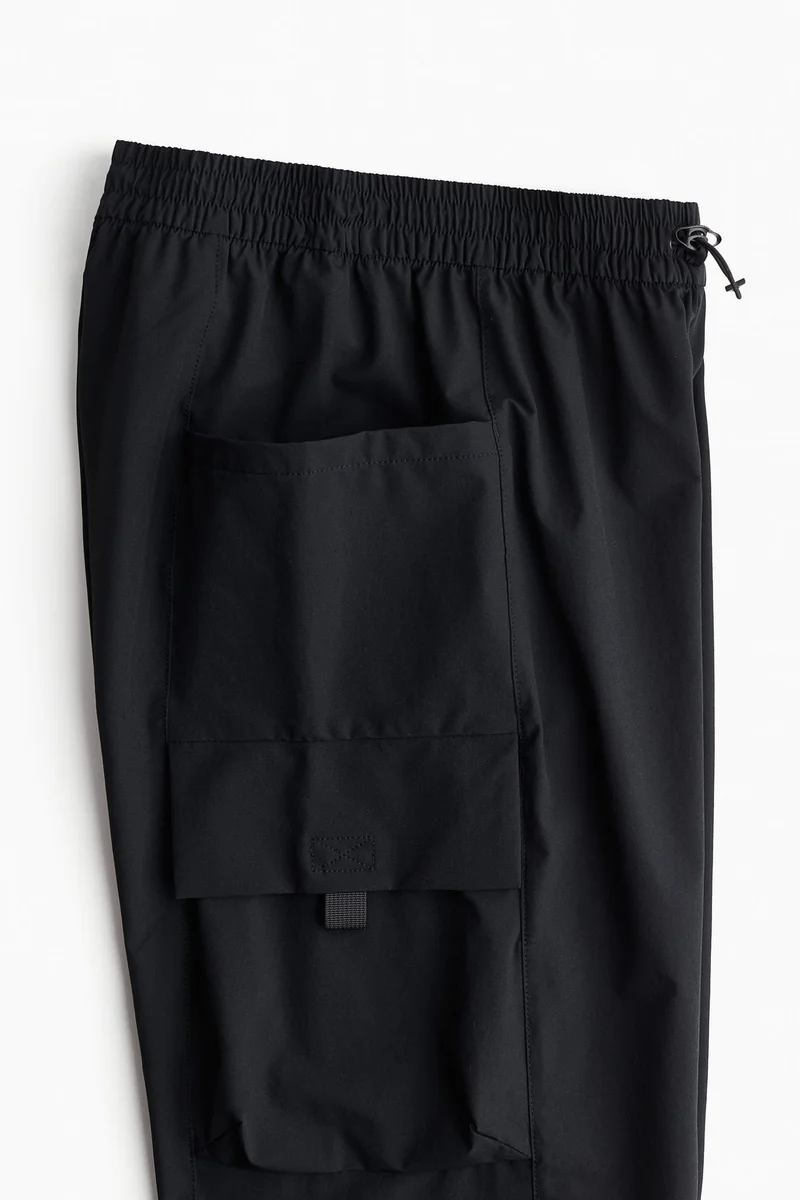 اتش اند ام بنطلون رياضي للمشي من نسيج مقاوم للماء