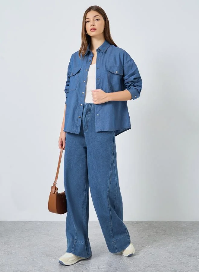 ستايلي قميص دنيم بجيبين بقصة فضفاضة