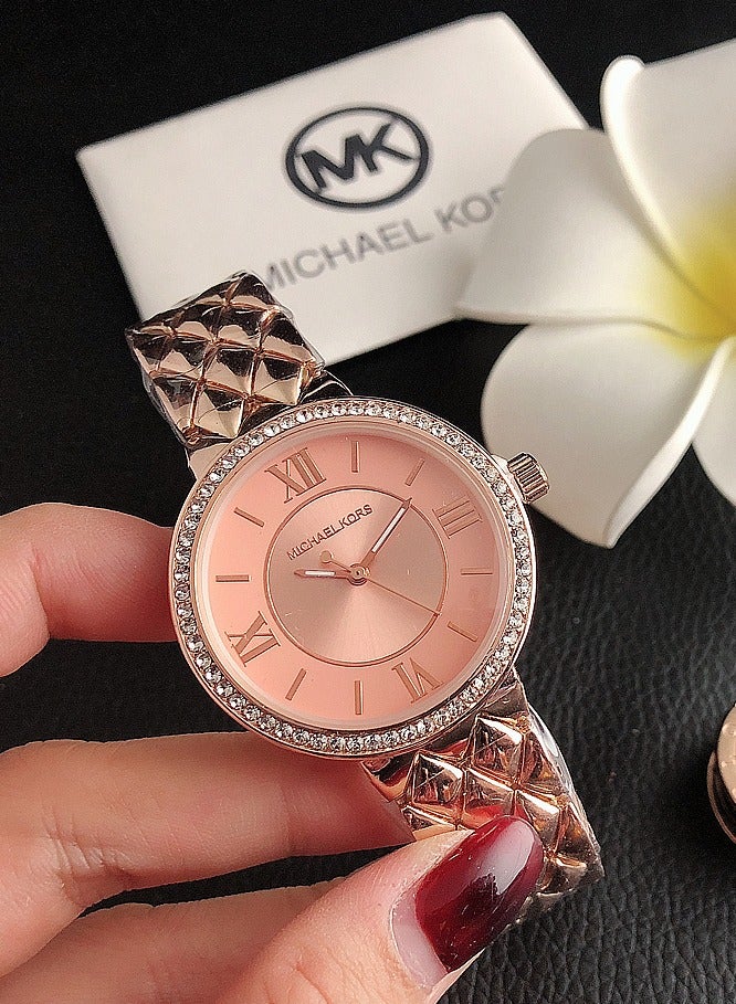 MK Michael Kors MK Women's Watch Rose Gold Tone Strap with Rhombic Textured Design and  Pink Dial Adorned with Sparkling Crystals - Image 1