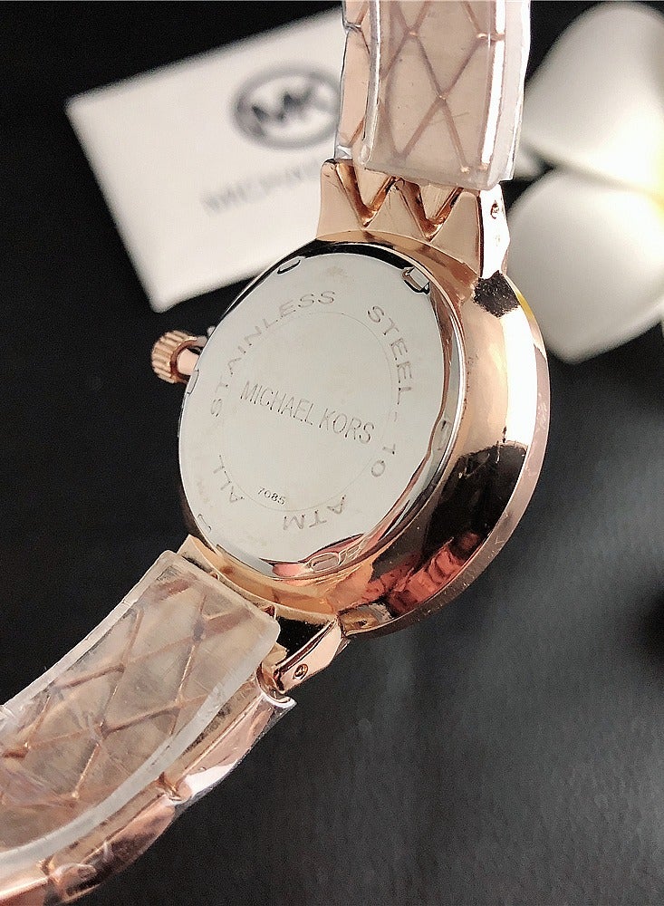 MK Michael Kors MK Women's Watch Rose Gold Tone Strap with Rhombic Textured Design and  Pink Dial Adorned with Sparkling Crystals - Image 3