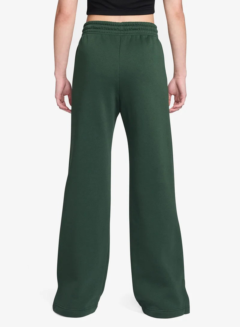 نايكي سروال رياضي واسع الساق بشعار فينيكس من نايكي فليس عالي الخصر