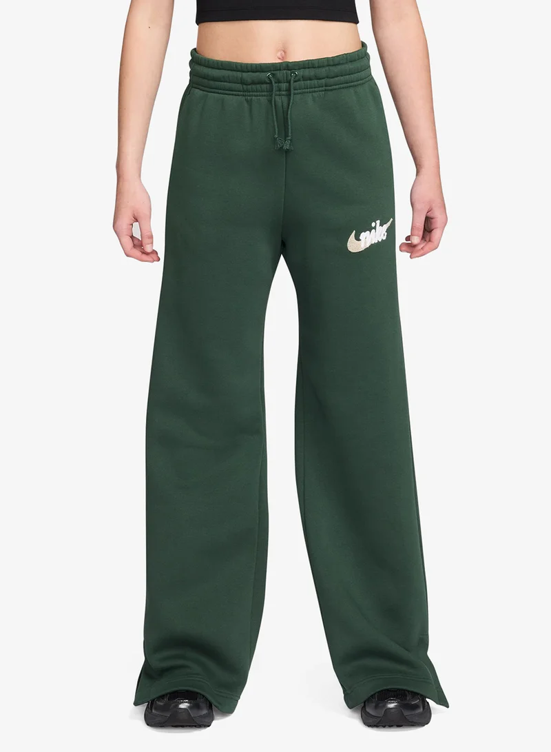 نايكي سروال رياضي واسع الساق بشعار فينيكس من نايكي فليس عالي الخصر