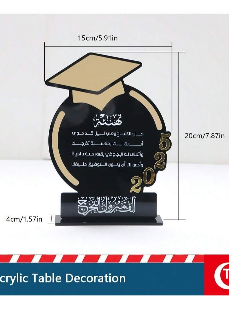 Graduation Decoration Acrylic table décor in black and gold featuring supportive graduation phrases, adorned with a gold graduation cap and the year numbers. One piece.