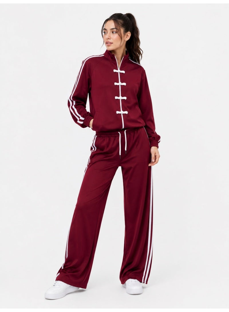 Caesar Women's sporty tracksuit featuring a zipper and drawstring ties at the chest. - Image 1