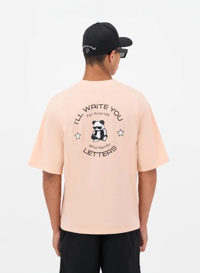I'LL WRITE YOU LETTERS FAM Oversize in Peach