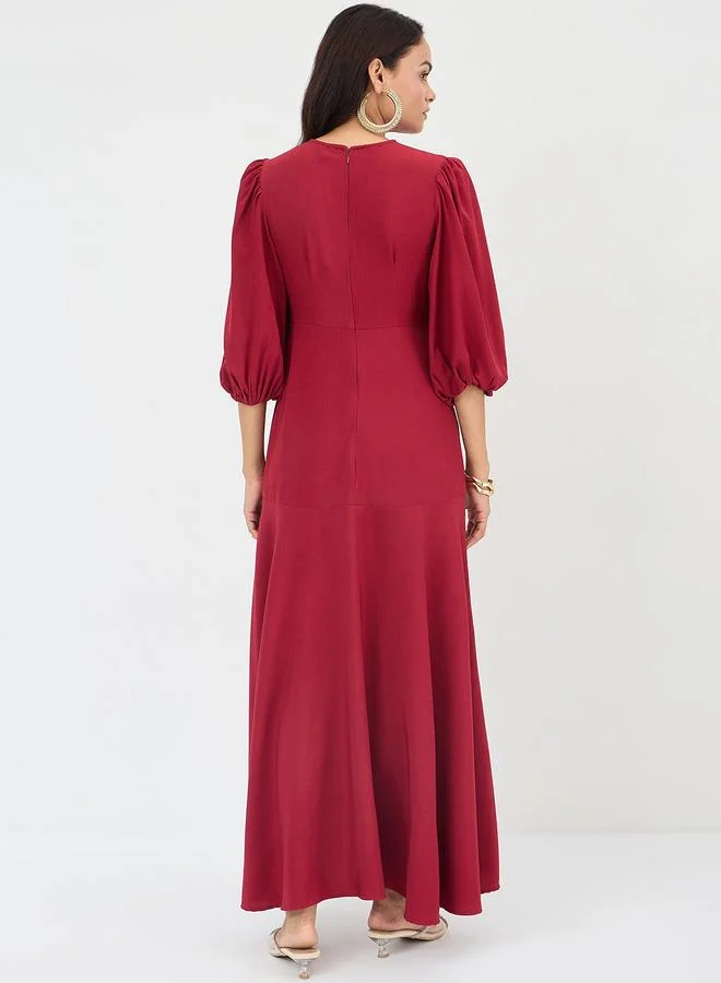 فيميلا فستان طويل ملفوف بكشكش وأكمام منفوخة