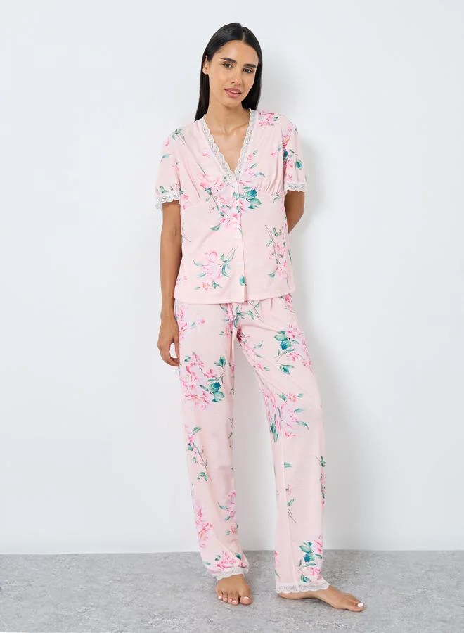 ستايلي طقم من بنطال بيجاما وبلوزة بحافة متعرجة