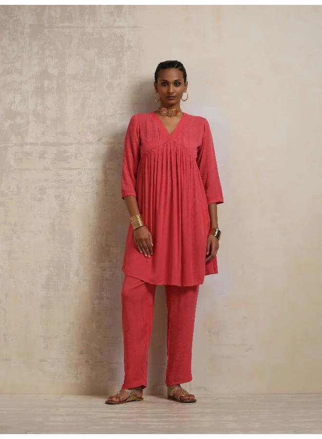 ترو برونز طقم كورتا واسع مجعد باللون الخوخي