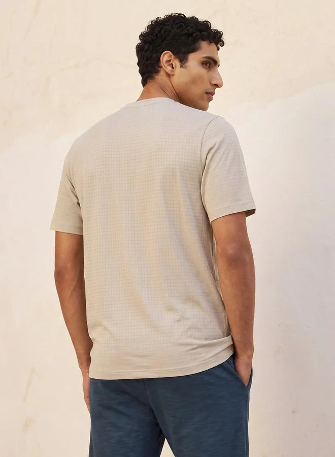 Kappa WHITE Kappa 2 Way Stretch Textured Performance T shirt for Men | Best Price UAE