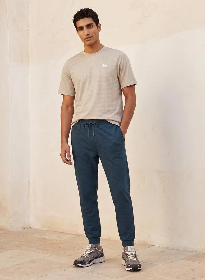 Kappa WHITE Kappa 2 Way Stretch Textured Performance T shirt for Men | Best Price UAE