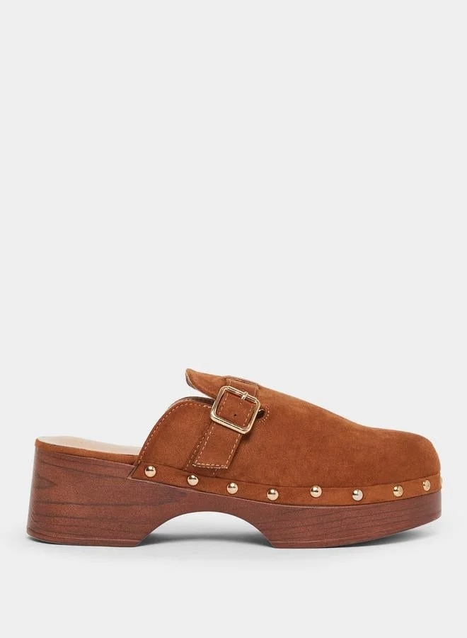 ستايلي حذاء ميولز بكعب سميك مرصع مع مشبك أمامي