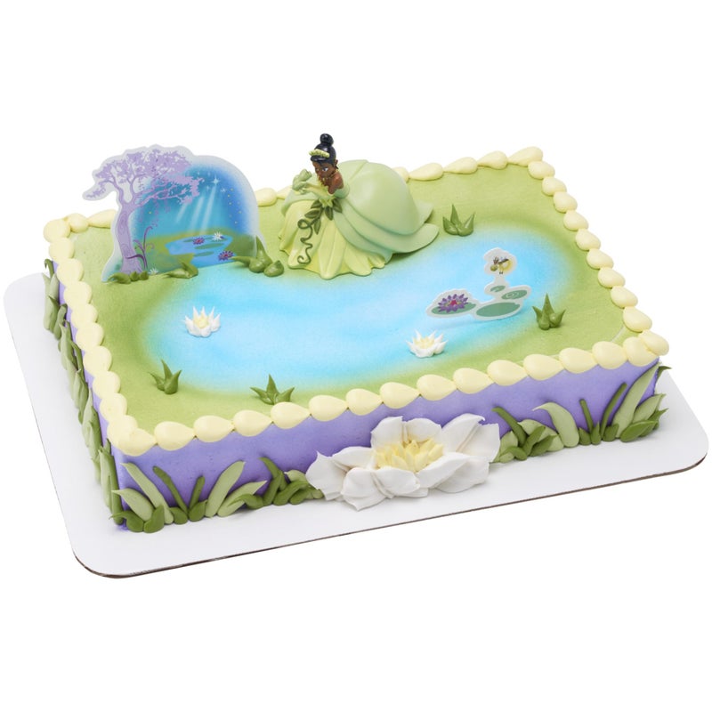 DecoPac DecoSetÂ® Disney Princess Tiana Cake Topper, 3-Piece Cake Decoration With Tiana And Frog Figurine, Water Lily Pic, And Background Scenery Pic - Image 1