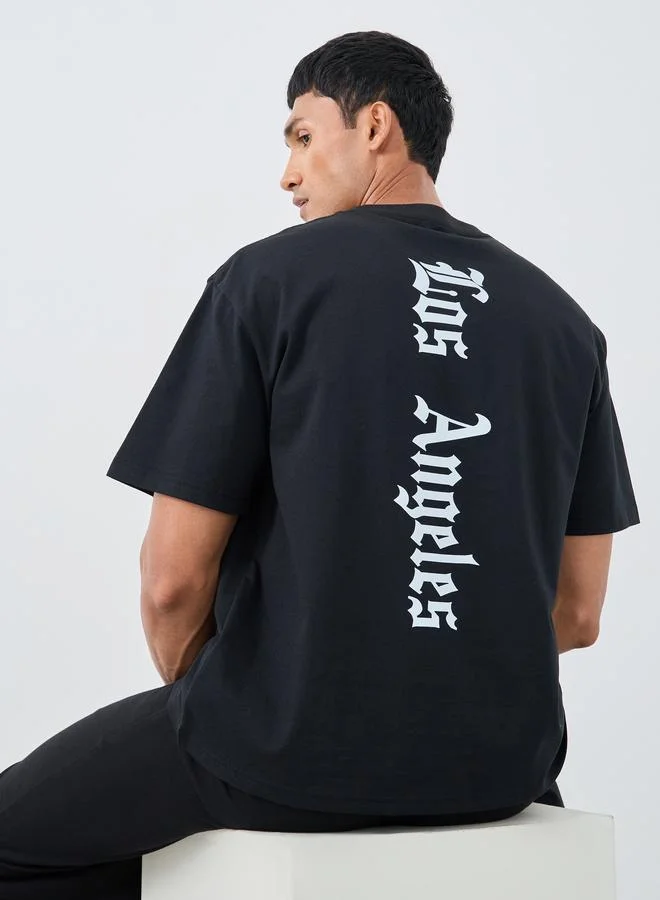 Styli Slogan Back Printed Crew Neck Oversized T-Shirt