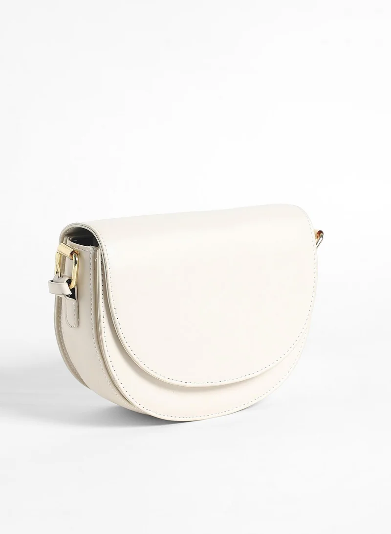 Haute Sauce Haute Sauce Women's Urban Curve Sling Bag For Casual Wear | Ivory White Colour | One-Size| Magnetic Closure | Vegan Leather Material | Detachable Sling | Handbag For Woman & Girls
