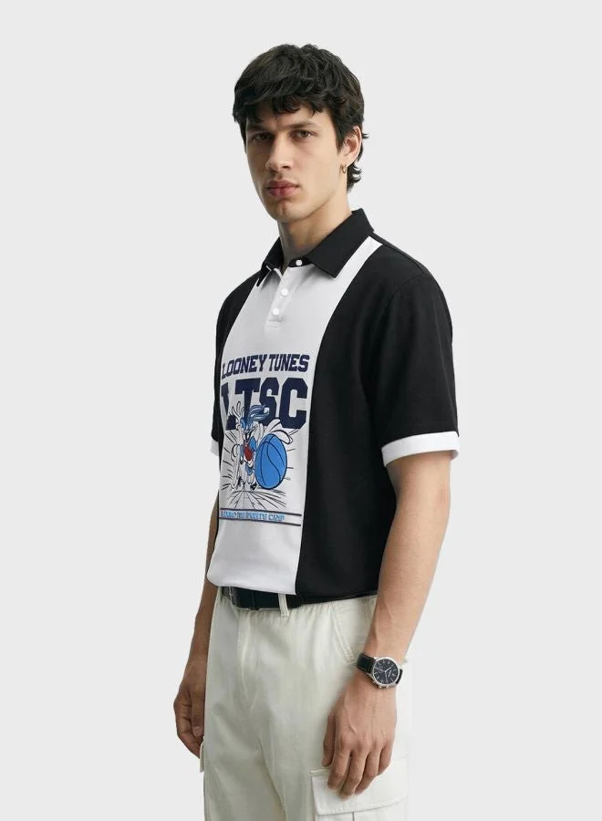 ذا انديان كراج كو Men Boxy Fit Looney Tunes Printed Polo Neck Half Sleeves Polo T-Shirt
