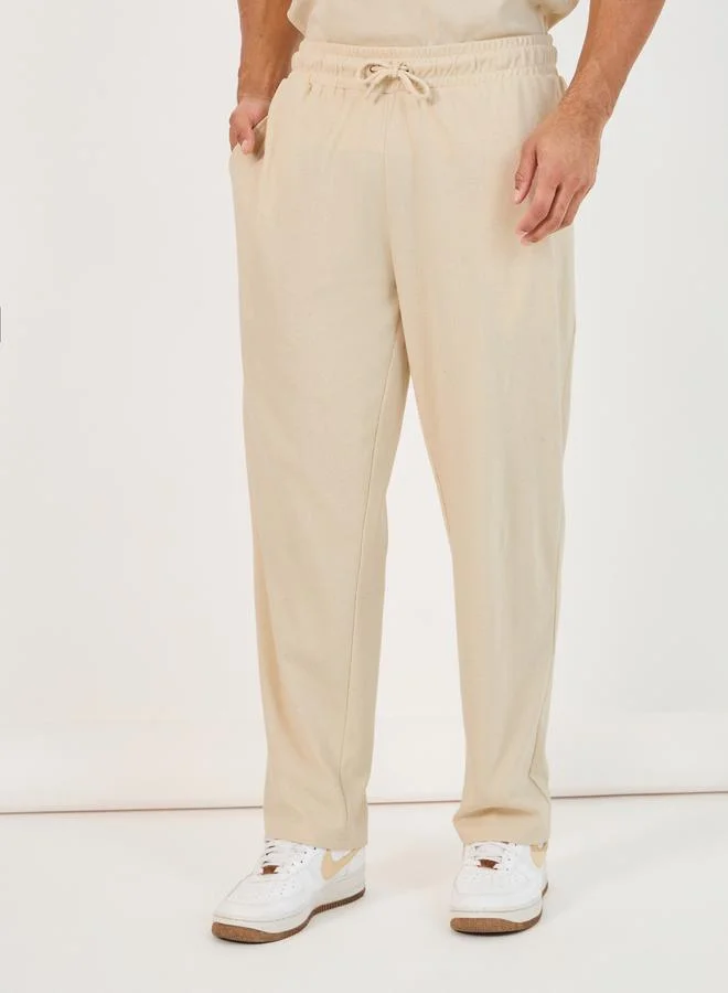 Styli Back Print Oversized T-Shirt & Open Hem Interlock Joggers Co-Ords