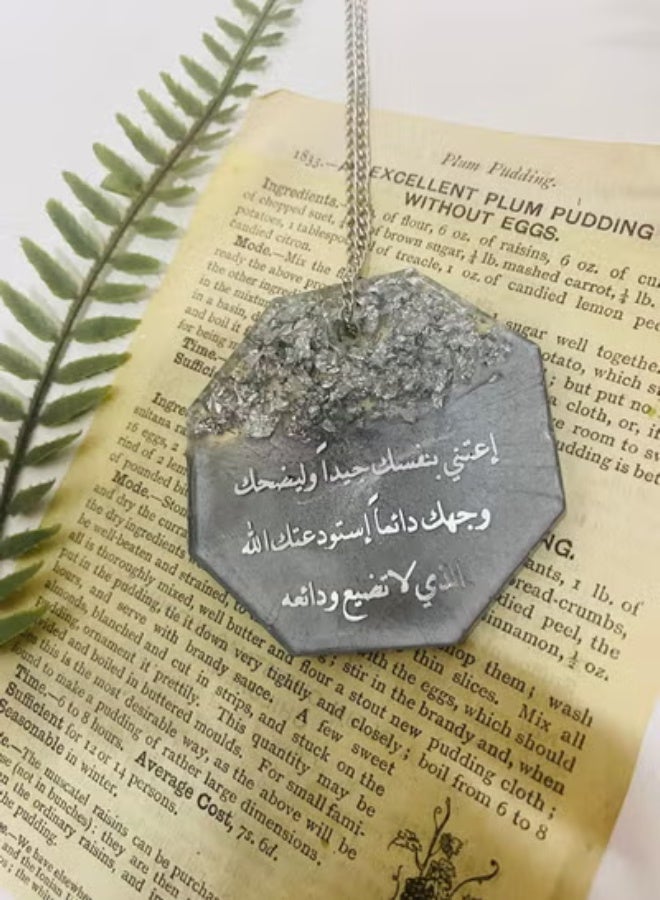 An elegant silver embroidered car pendant from luxurious resin - Image 1