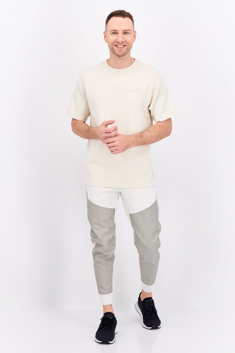 PUMA Men Sportswear Fit Short Sleeves Outdoor T-Shirt, Cream - Image 4