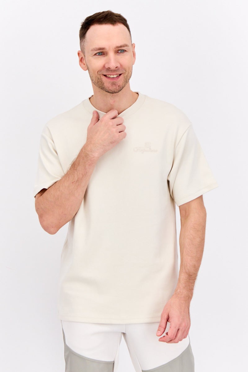 PUMA Men Sportswear Fit Short Sleeves Outdoor T-Shirt, Cream - Image 1