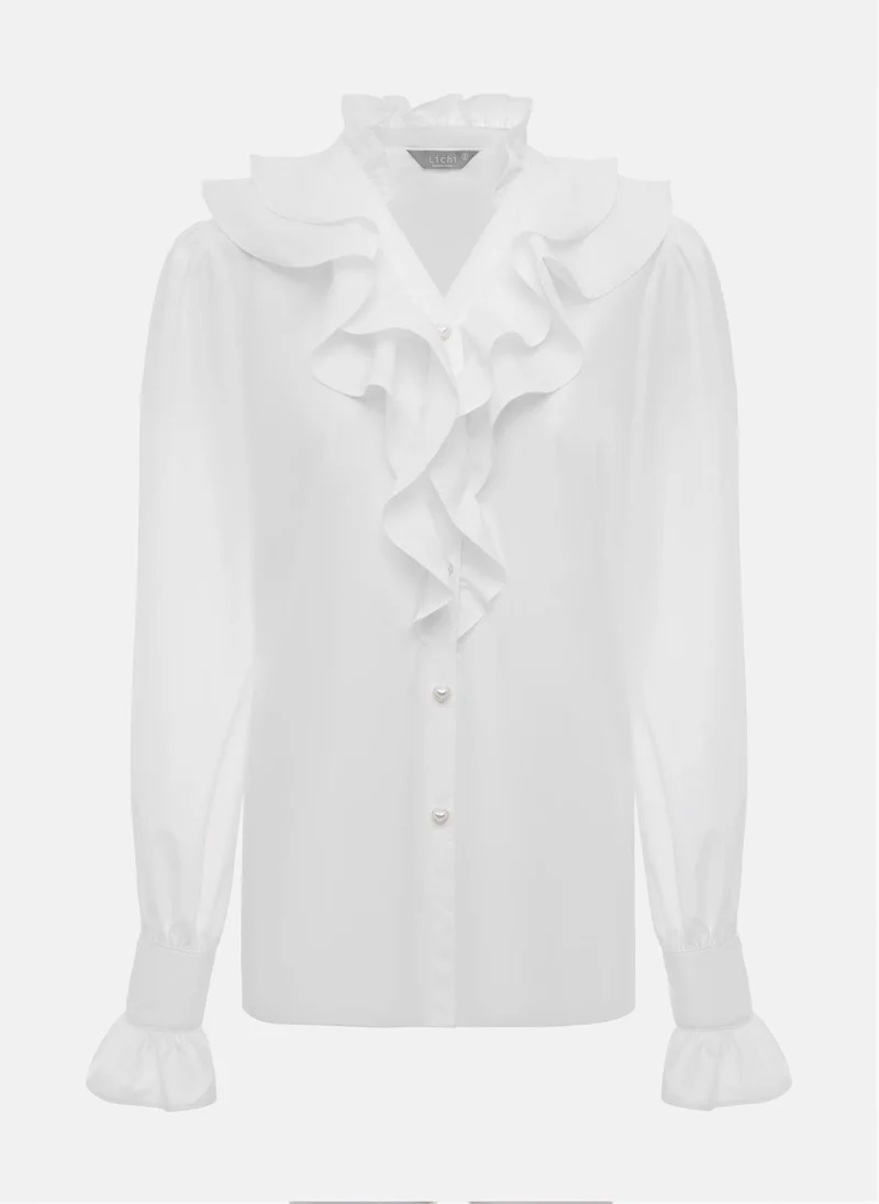 Lichi Straight blouse with ruffle at the collar